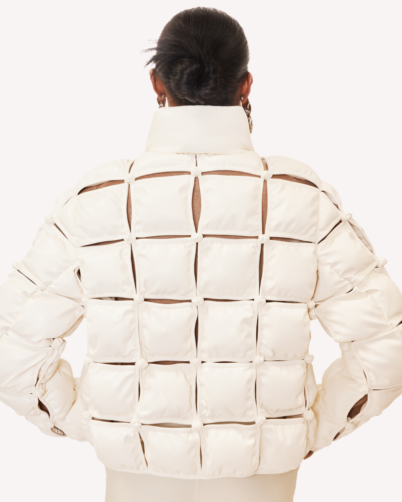 Womens vegan leather fall winter puffer coat jacket called the Palmer coat with zipper. Back view.